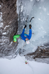 Climber doing ice climbing in Bodo, Nordland, Norway Climber doing ice climbing in Bodo, Nordland, Norway